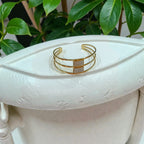 Designed with a sleek double-bar open cuff Bracelet - Anti-Tarnish
