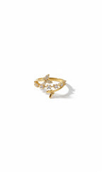 A delicate gold ring featuring a small bow at the center, adorned with tiny clear stones along the band, set against a plain white background with a soft shadow.
Grishita Jewellery