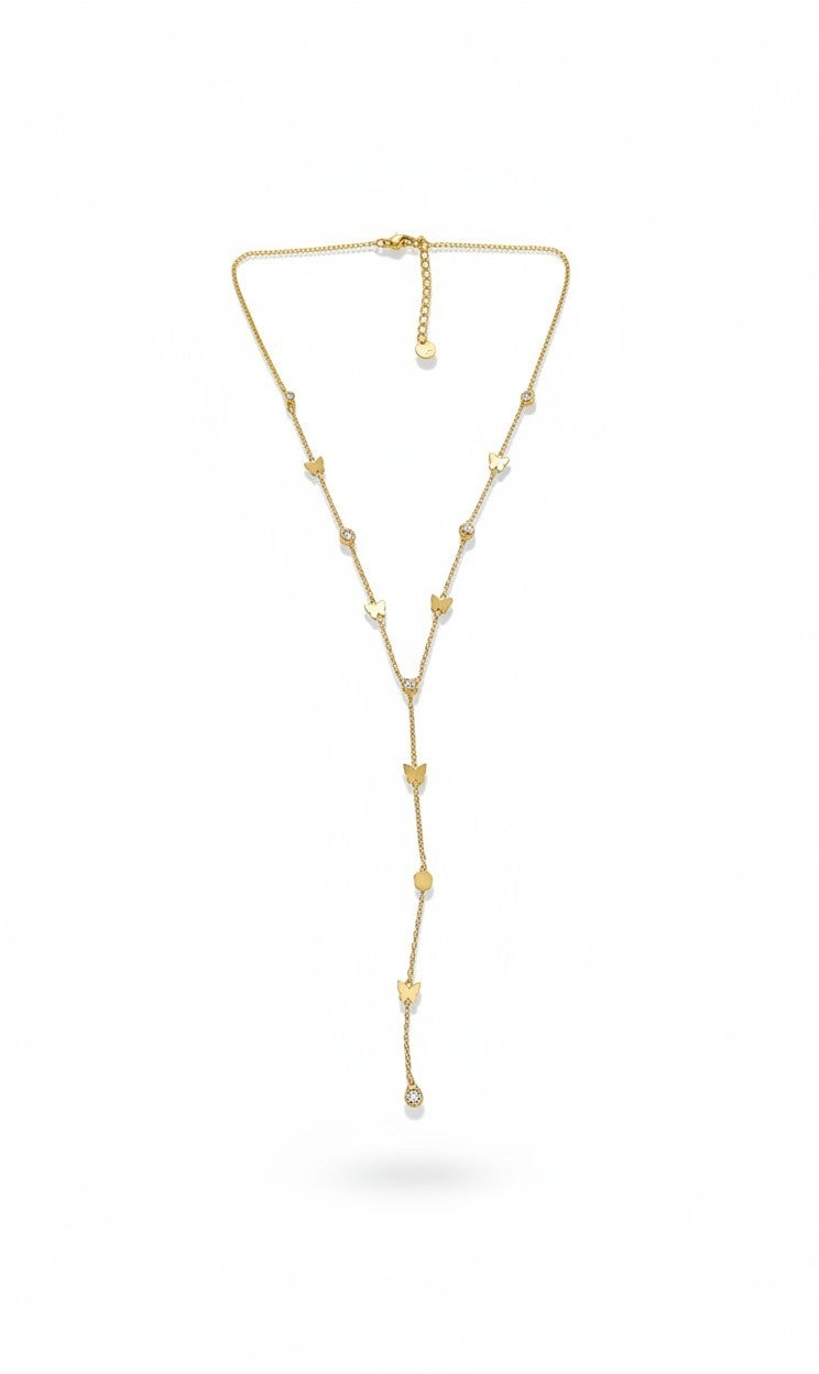 A delicate gold Y-shaped lariat necklace with small gold star charms and a single white pearl bead at the bottom, displayed on a clean white background.
Grishita Jewellery